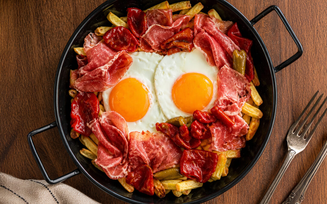 Huevos rotos con pimientos del piquillo